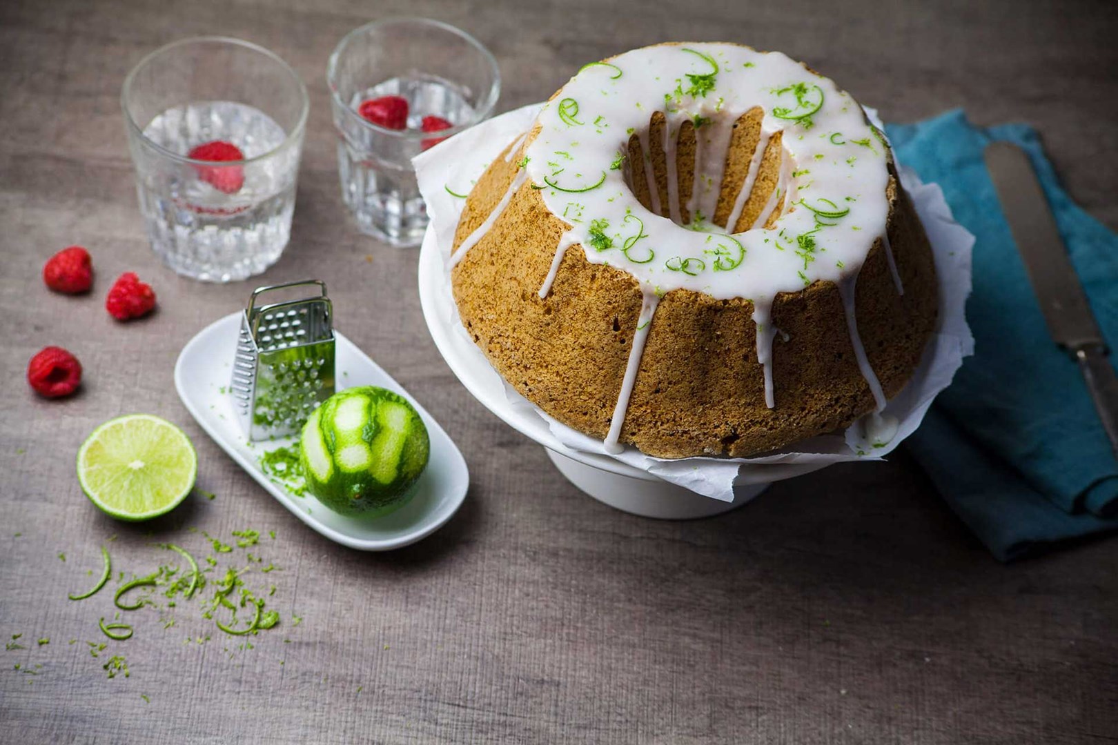 Vegan sponge cake with lime glaze served on a plate